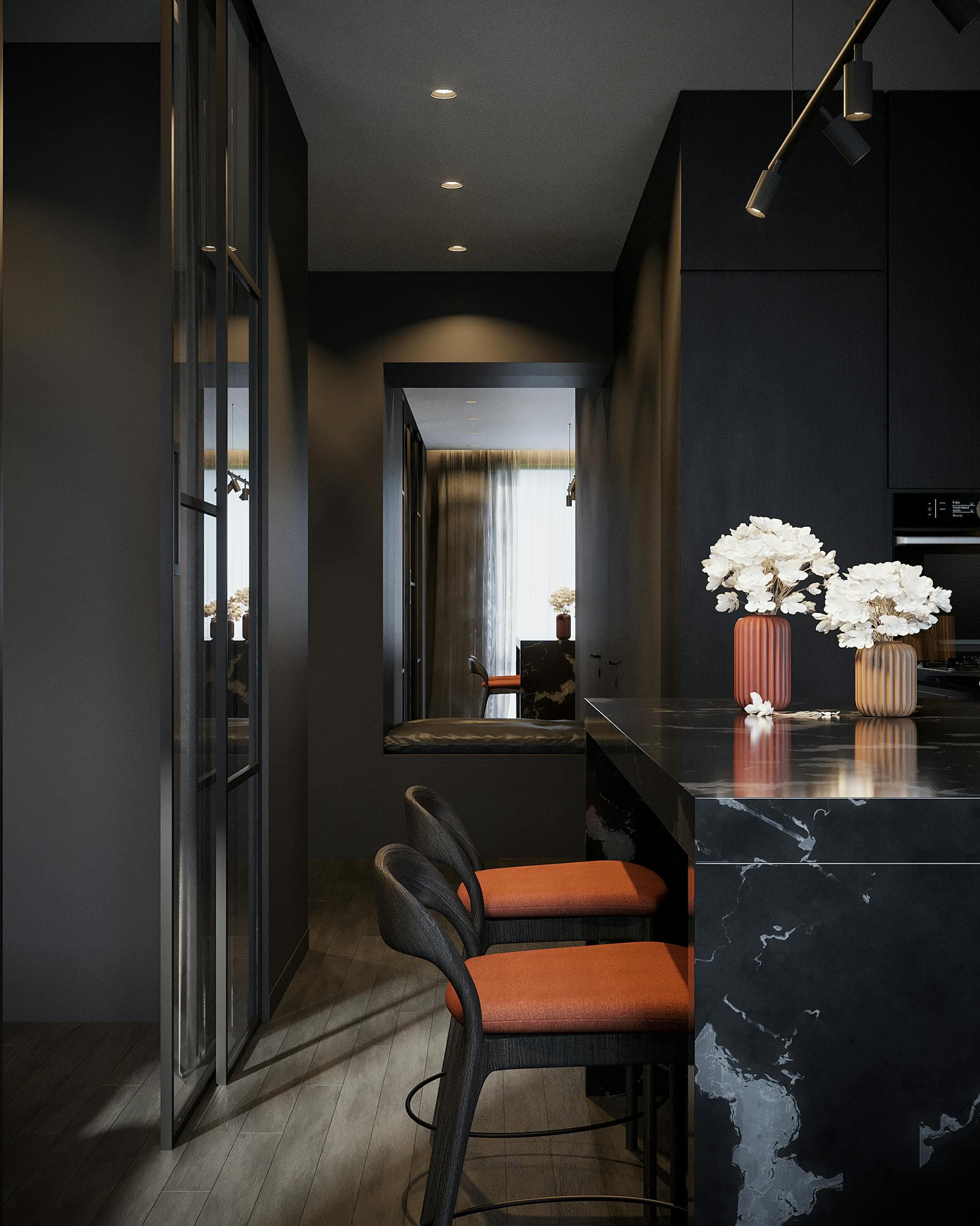 Dark modern kitchen with a black marble waterfall island