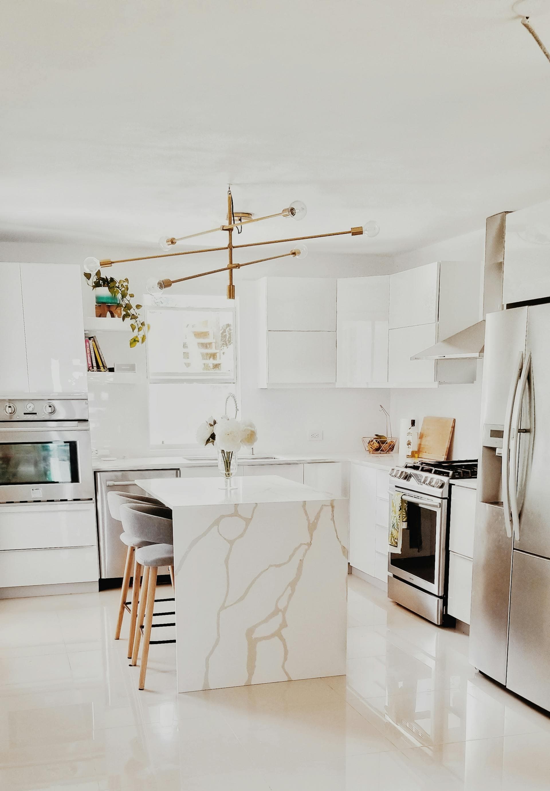 Quartz kitchen countertop with a waterfall island