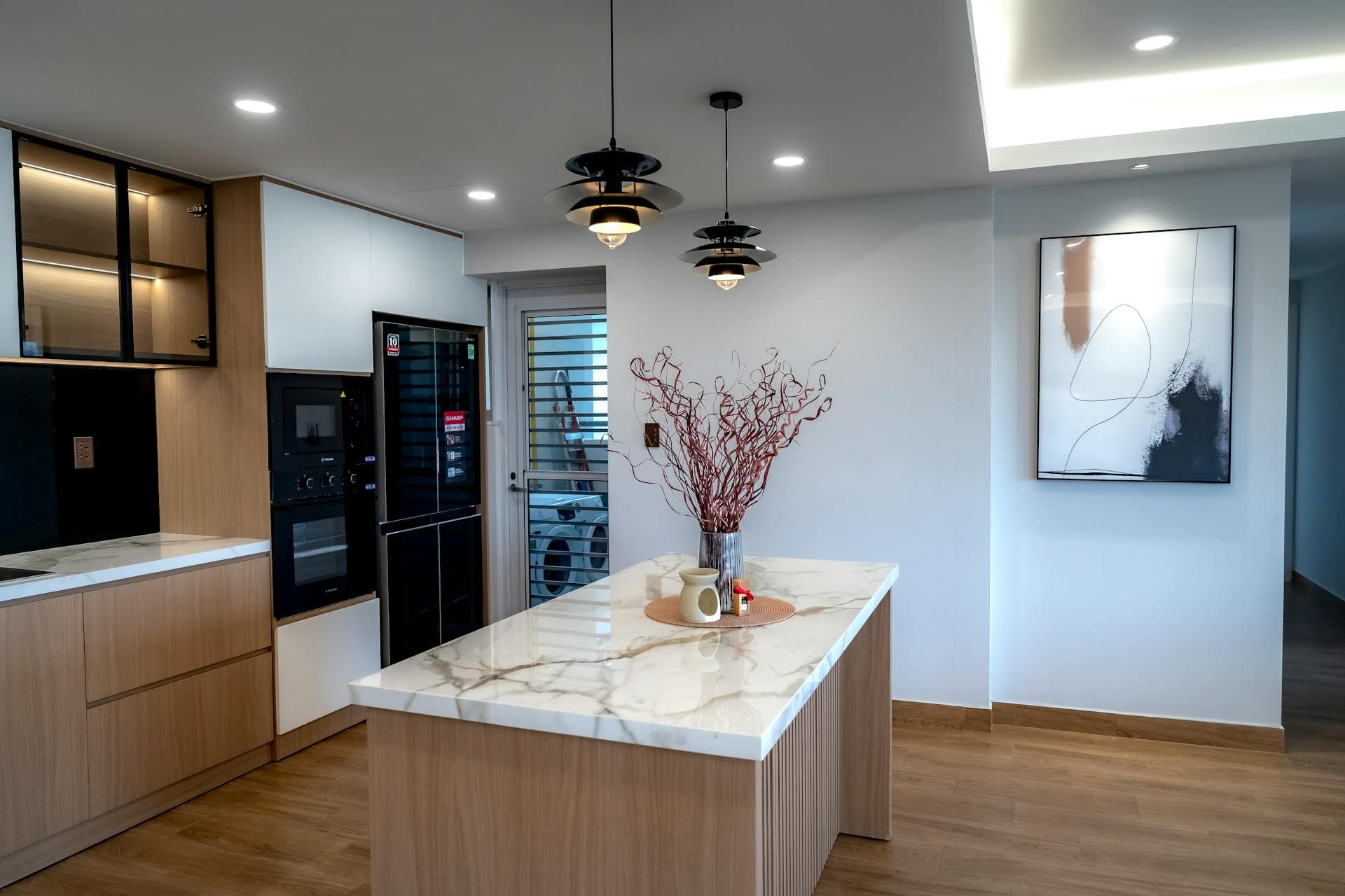 Luxury contemporary kitchen island with pendant lights