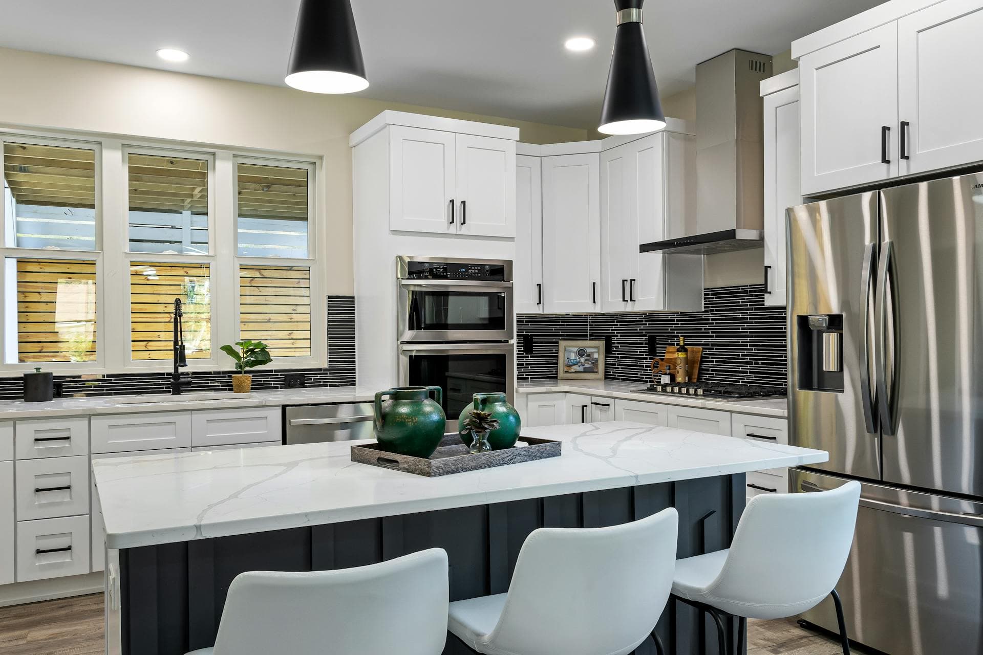 Modern kitchen with a custom stone countertop and island in a Northern Virginia home